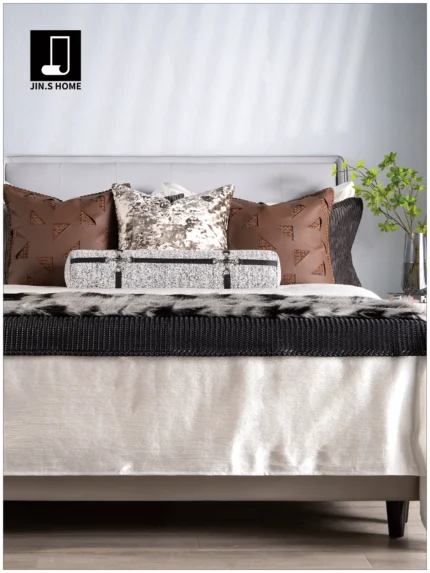 Italian-style light luxury brown bedding set for a soft-decorated model home, featuring hand-woven throw blankets and pillows with a peacock feather-inspired design