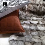 Custom-made fox fur throw blanket for a luxurious, upscale living room sofa; orange quilted embroidered backrest cushion - Image 4