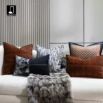 Custom-made fox fur throw blanket for a luxurious, upscale living room sofa; orange quilted embroidered backrest cushion - Image 3