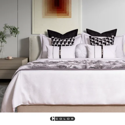 Soft Furnishings for Model Homes: Luxury 4-Piece Bedding Set in Nordic Black, White, and Brown with Gold Accents and Tasseled Pillows