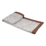 Showroom hotel villa: Italian-style luxury sofa with throw and bedspread; coffee-colored leather-trimmed textured bedside throw - Image 3