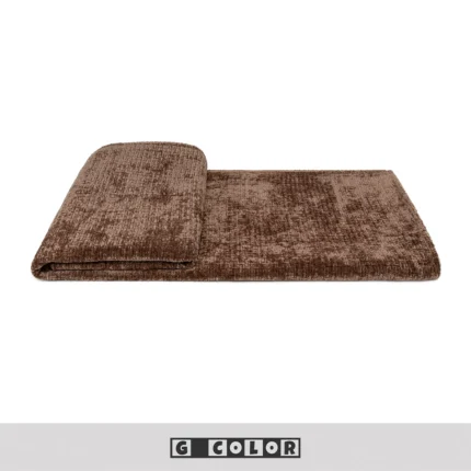 Soft Furnishings for Model Homes: Scandinavian Minimalist, Modern, and Italian-inspired Luxury Living Room with Bay Window; Coffee-colored Textured Rug and Footboard Rug