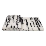 Showroom Hotel Villa: Italian-style modern luxury sofa with throw and bedspread; black-and-white tweed striped footboard throw - Image 5