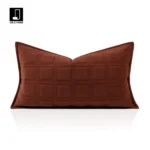 Custom-made fox fur throw blanket for a luxurious, upscale living room sofa; orange quilted embroidered backrest cushion