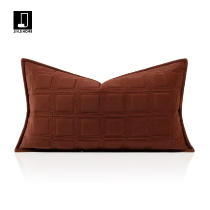 Custom-made fox fur throw blanket for a luxurious, upscale living room sofa; orange quilted embroidered backrest cushion