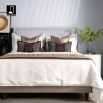 10-piece bedding set in shades of brown for model homes – upscale Italian hotel-style bedding with a bedspread, pillows, and pillowcases