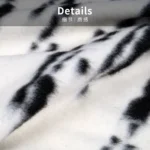 Showroom Hotel Villa: Italian-style modern luxury sofa with throw and bedspread; black-and-white tweed striped footboard throw - Image 3