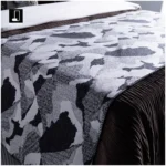 Modern luxury villa model home: bed throw, hotel-style sofa throw, black-and-white tweed footboard throw - Image 2